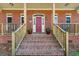 Brick home with inviting front porch at 1813 Albert Storm Ave, Moncks Corner, SC 29461