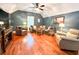 Spacious living area with hardwood floors, vaulted ceiling, and comfortable seating at 1813 Albert Storm Ave, Moncks Corner, SC 29461