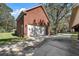 Attached brick garage with double doors and driveway at 1813 Albert Storm Ave, Moncks Corner, SC 29461