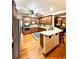 Spacious kitchen with island, stainless steel appliances, and hardwood floors at 1813 Albert Storm Ave, Moncks Corner, SC 29461