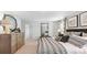 Main bedroom with a king-size bed and walk-in closet at 357 Willows Crescent Dr, Moncks Corner, SC 29461