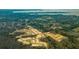 Aerial view of a community featuring new homes nestled in a wooded area at 357 Willows Crescent Dr, Moncks Corner, SC 29461