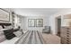 Main bedroom with a king-size bed and sitting area at 357 Willows Crescent Dr, Moncks Corner, SC 29461