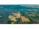 Aerial view showcasing a new residential development with houses and roads at 357 Willows Crescent Dr, Moncks Corner, SC 29461
