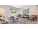 Living room with stylish furniture and a view to backyard at 357 Willows Crescent Dr, Moncks Corner, SC 29461