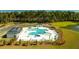 Resort-style pool with plenty of lounge chairs and umbrellas at 152 Yarrow Way, Moncks Corner, SC 29461