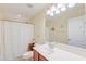 Clean bathroom with white vanity, shower, and toilet at 7002 Sassafrass Ct, Summerville, SC 29485