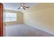 Spacious bedroom with large window and neutral walls at 7002 Sassafrass Ct, Summerville, SC 29485