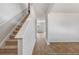 Modern staircase leading to the upper level of the home at 189 Morning View Way, Moncks Corner, SC 29461