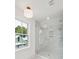 A large walk-in shower with marble tile and glass enclosure at 72 Drake St # B, Charleston, SC 29403