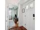 Entryway with hardwood floors and view into living area at 167 Coming St, Charleston, SC 29403