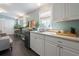 Well-equipped galley kitchen with white cabinets at 167 Coming St, Charleston, SC 29403