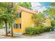 Yellow house with black shutters and red roof at 167 Coming St, Charleston, SC 29403