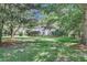 Two-story home with a front porch and mature trees at 3427 Colonel Vanderhorst Cir, Mount Pleasant, SC 29466