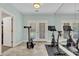 Bright home gym with Peloton bikes, rowing machine, and mirrored walls at 3427 Colonel Vanderhorst Cir, Mount Pleasant, SC 29466