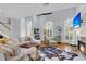 Open and airy living room with hardwood floors and a comfortable seating area at 3427 Colonel Vanderhorst Cir, Mount Pleasant, SC 29466