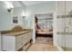 Bathroom with a large vanity, a view into the bedroom, and a walk-in shower at 3427 Colonel Vanderhorst Cir, Mount Pleasant, SC 29466