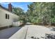 Spacious backyard with basketball court and mature trees at 3427 Colonel Vanderhorst Cir, Mount Pleasant, SC 29466