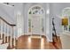 Bright and spacious entryway with hardwood floors and a grand staircase at 3427 Colonel Vanderhorst Cir, Mount Pleasant, SC 29466