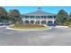 Elegant clubhouse with circular driveway and landscaping at 3427 Colonel Vanderhorst Cir, Mount Pleasant, SC 29466