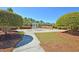 Community spray park with paved walking paths and landscaping at 3427 Colonel Vanderhorst Cir, Mount Pleasant, SC 29466