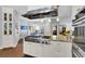 Island kitchen with granite countertops and stainless steel appliances at 3427 Colonel Vanderhorst Cir, Mount Pleasant, SC 29466