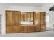 Garage with extensive built-in storage cabinets at 3427 Colonel Vanderhorst Cir, Mount Pleasant, SC 29466