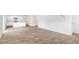 Open floor plan showcasing kitchen with island and adjacent living area with hardwood floors at 361 Willows Crescent Dr, Moncks Corner, SC 29461