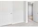 Bright bedroom with neutral walls, carpet flooring, and access to another room at 361 Willows Crescent Dr, Moncks Corner, SC 29461