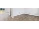 Bright living room with wood-look flooring and sliding glass doors to backyard at 361 Willows Crescent Dr, Moncks Corner, SC 29461