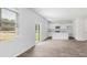 Open concept kitchen with white cabinets, granite countertops and island at 361 Willows Crescent Dr, Moncks Corner, SC 29461