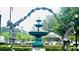 Bronze fountain statue with two reaching for a floral wreath at 361 Willows Crescent Dr, Moncks Corner, SC 29461