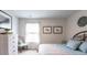 Bright bedroom with queen-size bed and ample natural light at 353 Willows Crescent Way, Moncks Corner, SC 29461