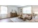 Bright living room with hardwood floors and comfy seating at 353 Willows Crescent Way, Moncks Corner, SC 29461