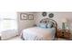 Cozy bedroom with full-size bed and calming decor at 353 Willows Crescent Way, Moncks Corner, SC 29461