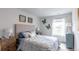 Bedroom with queen-size bed and stylish decor at 353 Willows Crescent Way, Moncks Corner, SC 29461