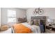 Bedroom with full-size bed and bicycle wall art at 353 Willows Crescent Way, Moncks Corner, SC 29461