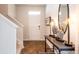 Bright entryway with hardwood floors and a modern console table at 353 Willows Crescent Way, Moncks Corner, SC 29461