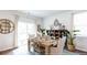Charming dining room with a rustic wooden table and seating at 353 Willows Crescent Way, Moncks Corner, SC 29461
