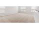 Spacious upstairs bedroom with carpeted floors and multiple windows at 373 Willows Crescent Dr, Moncks Corner, SC 29461