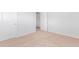 Well-lit bedroom with carpet flooring and access to hallway at 373 Willows Crescent Dr, Moncks Corner, SC 29461