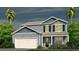 Two-story house with blue siding, white garage door, and landscaping at 373 Willows Crescent Dr, Moncks Corner, SC 29461