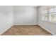 Simple bedroom with wood-look flooring and window at 373 Willows Crescent Dr, Moncks Corner, SC 29461