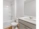 Bathroom with tub, toilet, vanity, and a large mirror at 373 Willows Crescent Dr, Moncks Corner, SC 29461