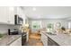 Modern kitchen with granite countertops and island at 409 Peachwood Ln, Moncks Corner, SC 29461