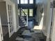 Bright and airy entryway with hardwood floors and a staircase at 174 Whaler Ave, Summerville, SC 29486