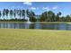 Serene community pond with fountain and lush landscaping at 174 Whaler Ave, Summerville, SC 29486