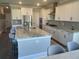 Modern kitchen featuring stainless steel appliances and granite countertops at 174 Whaler Ave, Summerville, SC 29486