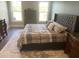Main bedroom with plush carpet and large windows overlooking the water at 174 Whaler Ave, Summerville, SC 29486