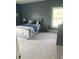 Bright bedroom with plush carpeting and ample natural light at 174 Whaler Ave, Summerville, SC 29486